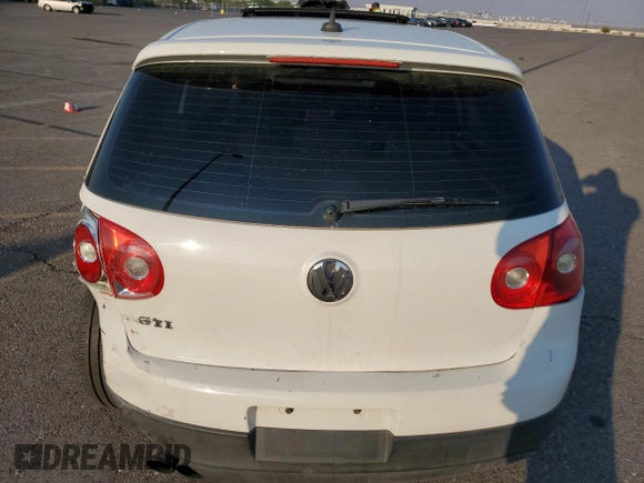 2009 Volkswagen GTI z VIN WVWHV71K89W101309, wystawiony jako Copart lot #70181114 z przebiegiem 121 728 mil mil oraz Szkoda całkowita • Salvage title. Historia ofert i sprzedaży dostępna na DreamBid. Obrazek 6.