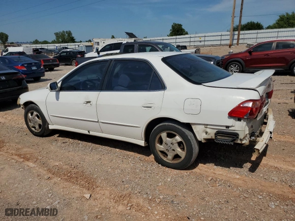 1999 Honda Accord Sdn EX with VIN JHMCG5657XC021847, listed as a Copart auction lot 61145114 with 260,581 mi miles and Salvage Title. Bid and sale history available at carsss.com. Image 2.