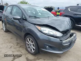 2018 Ford Fiesta SE with VIN 3FADP4EJ7JM127256, listed as a IAAI auction lot 41938121 with 83,211 mi miles. Bid and sale history available at carsss.com. Image 1.