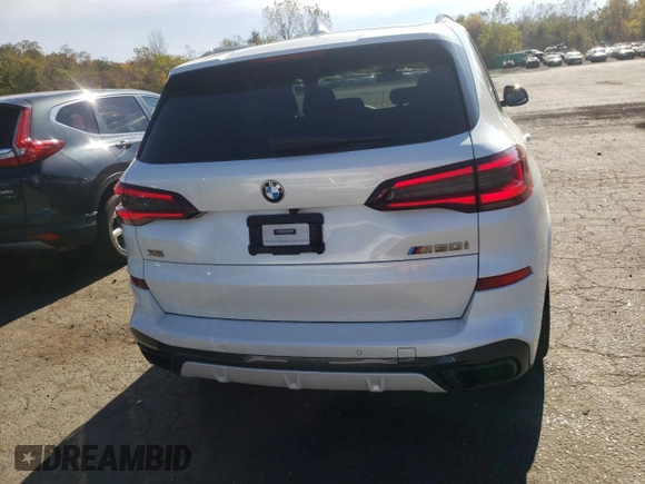 2020 BMW X5 M50i with VIN 5UXJU4C06L9C45320, listed as a Copart auction lot 74911604 with 78,465 mi miles and Salvage Title. Bid and sale history available at carsss.com. Image 6.