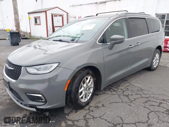 2021 Chrysler Pacifica Touring L with VIN 2C4RC1BG0MR543634, listed as a IAAI auction lot 41513467 with 148,010 mi miles and . Bid and sale history available at DreamBid. Image 17.