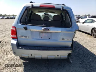 2009 Ford Escape Hybrid z VIN 1FMCU49309KA30344, wystawiony jako Copart lot #55644835 z przebiegiem 112 641 mil mil oraz Szkoda całkowita • Salvage title. Historia ofert i sprzedaży dostępna na DreamBid. Obrazek 6.