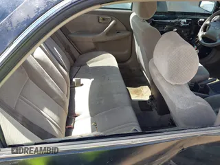 2000 Toyota Camry CE z VIN 4T1BG22K1YU663544, wystawiony jako IAAI lot #42252413 z przebiegiem 338 875 mil mil oraz . Historia ofert i sprzedaży dostępna na DreamBid. Obrazek 8.