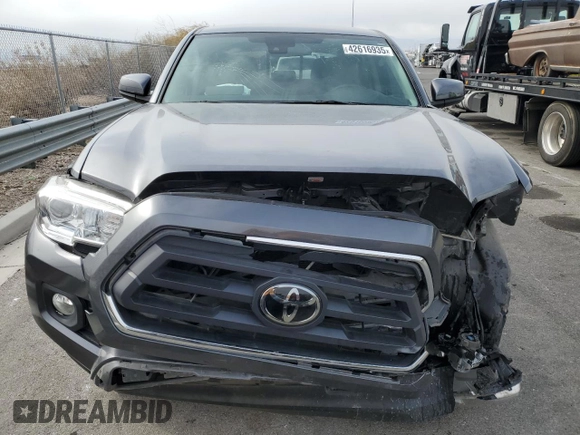 2021 Toyota Tacoma SR with VIN 3TYAX5GN7MT021255, listed as a Copart auction lot 42616935 with 64,626 mi miles and Salvage title. Bid and sale history available at DreamBid. Image 5.