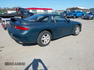 1997 Mitsubishi 3000GT z VIN JA3AM44H8VY001162, wystawiony jako IAAI lot #41933754 z przebiegiem 157 314 mil mil oraz . Historia ofert i sprzedaży dostępna na DreamBid. Obrazek 4.