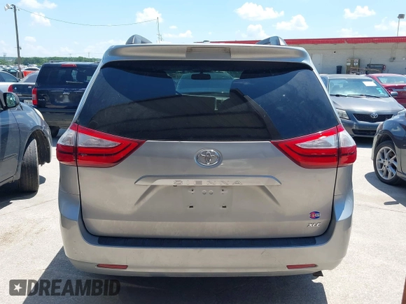 2015 Toyota Sienna XLE with VIN 5TDYK3DC0FS555636, listed as a IAAI auction lot 42099577 with 114,975 mi miles. Bid and sale history available at carsss.com. Image 16.