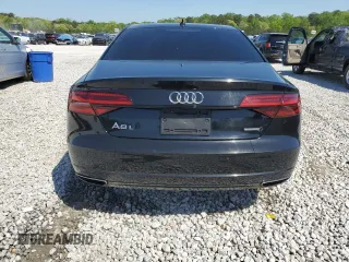 2017 Audi A8 with VIN WAU44AFD0HN006074, listed as a Copart auction lot 52421465 with 144,744 mi miles and Salvage title. Bid and sale history available at DreamBid. Image 6.