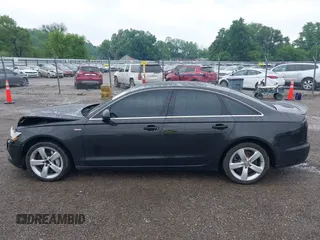 2012 Audi A6 Premium Plus with VIN WAUGGAFC2CN126317, listed as a IAAI auction lot 42407579 with 131,644 mi miles and . Bid and sale history available at DreamBid. Image 14.