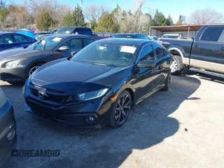 2019 Honda Civic Sport with VIN 19XFC2F80KE033598, listed as a IAAI auction lot 41732698 with 101,664 mi miles and . Bid and sale history available at DreamBid. Image 2.