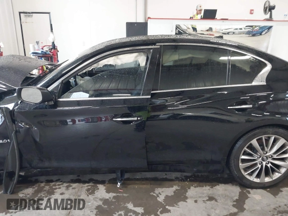 2019 Infiniti Q50 3.0t LUXE with VIN JN1EV7AP1KM512392, listed as a IAAI auction lot 40055915 with 103,485 mi miles. Bid and sale history available at carsss.com. Image 14.