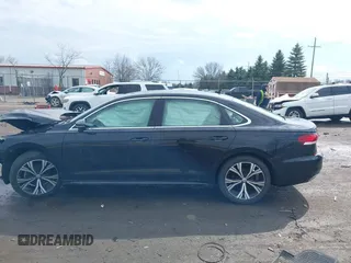 2021 Volkswagen Passat SE z VIN 1VWSA7A36MC014185, wystawiony jako IAAI lot #41915701 z przebiegiem 175 043 mil mil oraz . Historia ofert i sprzedaży dostępna na DreamBid. Obrazek 14.