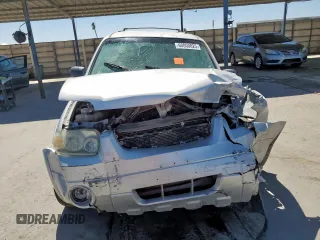 2005 Ford Escape Hybrid z VIN 1FMCU96H75KB95718, wystawiony jako Copart lot #60000825 z przebiegiem Nie podano mil oraz Czysty tytuł • Clean title. Historia ofert i sprzedaży dostępna na DreamBid. Obrazek 5.