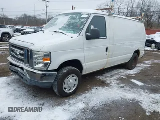 2011 Ford Econoline Cargo Commercial with VIN 1FTNE1EWXBDA35585, listed as a IAAI auction lot 41349320 with 122,311 mi miles and . Bid and sale history available at carsss.com. Image 17.