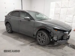 2024 Mazda CX-30 2.5 S Carbon Edition with VIN 3MVDMBCM8RM699063, listed as a IAAI auction lot 41319272 with 10,860 mi miles. Bid and sale history available at carsss.com. Image 1.