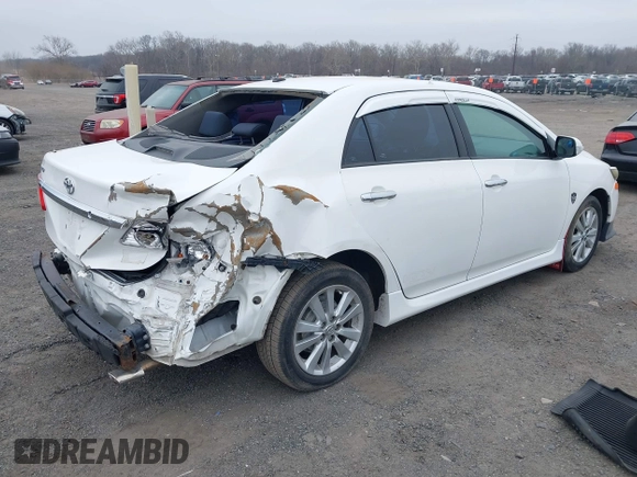 2011 Toyota Corolla L with VIN 2T1BU4EE8BC681039, listed as a IAAI auction lot 41798321 with 195,583 mi miles. Bid and sale history available at carsss.com. Image 4.