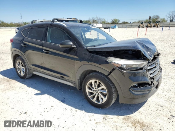 2017 Hyundai Tucson SE with VIN KM8J33A40HU409713, listed as a Copart auction lot 50105805 with 100,463 mi miles and Salvage Title. Bid and sale history available at DreamBid. Image 4.