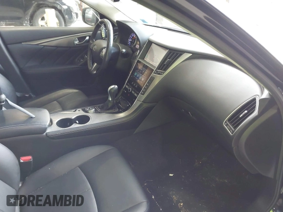 2015 Infiniti Q50 Premium z VIN JN1BV7AR9FM423471, wystawiony jako IAAI lot #42641857 z przebiegiem 86 919 mil mil oraz . Historia ofert i sprzedaży dostępna na DreamBid. Obrazek 5.