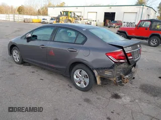 2013 Honda Civic LX with VIN 19XFB2F56DE053799, listed as a IAAI auction lot 40701262 with 191,234 mi miles and . Bid and sale history available at DreamBid. Image 3.