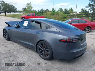 2023 Tesla Model S with VIN 5YJSA1E54PF501565, listed as a IAAI auction lot 42244953 with Not provided miles and . Bid and sale history available at DreamBid. Image 3.
