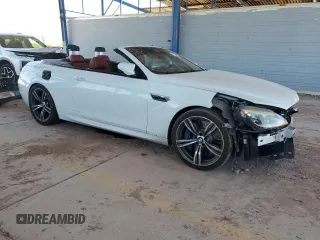 2013 BMW M6 с VIN WBSLZ9C59DDZ77823, выставлен на аукционе Copart как лот 62354225 с пробегом 74 704 миль миль и Списание • Salvage title. История ставок и продаж доступна на DreamBid. Изображение 4.