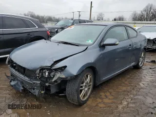 2010 Scion tC z VIN JTKDE3B77A0317752, wystawiony jako Copart lot #48753564 z przebiegiem Nie podano mil oraz Szkoda całkowita • Salvage title. Historia ofert i sprzedaży dostępna na DreamBid. Obrazek 1.