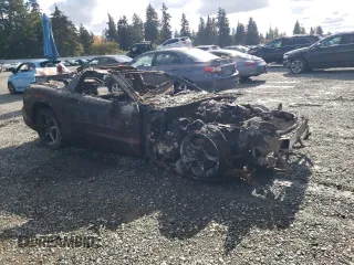 2002 Chevrolet Corvette with VIN 1G1YY22G225117384, listed as a Copart auction lot 77211944 with 0 mi miles and Salvage Title. Bid and sale history available at carsss.com. Image 4.