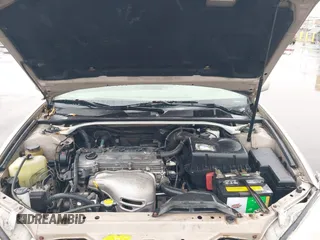 2002 Toyota Camry LE z VIN JTDBE32KX20022844, wystawiony jako IAAI lot #41392677 z przebiegiem 155 533 mil mil oraz . Historia ofert i sprzedaży dostępna na DreamBid. Obrazek 10.