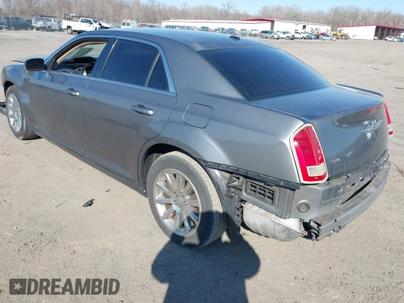 2012 Chrysler 300 with VIN 2C3CCAAG1CH138303, listed as a IAAI auction lot 41773979 with 252,550 mi miles and . Bid and sale history available at DreamBid. Image 3.