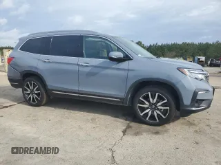 2022 Honda Pilot Touring 7-Passenger z VIN 5FNYF5H69NB031540, wystawiony jako Copart lot #51661185 z przebiegiem 58 316 mil mil oraz Szkoda całkowita • Salvage title. Historia ofert i sprzedaży dostępna na DreamBid. Obrazek 4.