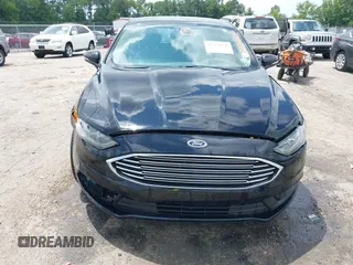 2017 Ford Fusion SE z VIN 3FA6P0H71HR363643, wystawiony jako IAAI lot #42764856 z przebiegiem 82 805 mil mil oraz . Historia ofert i sprzedaży dostępna na DreamBid. Obrazek 12.