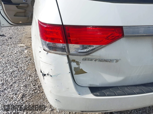 2014 Honda Odyssey LX with VIN 5FNRL5H24EB001551, listed as a IAAI auction lot 41879040 with 119,200 mi miles and . Bid and sale history available at DreamBid. Image 6.