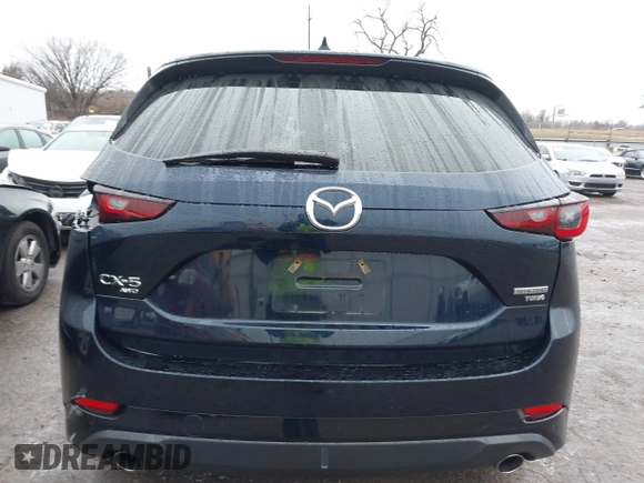 2022 Mazda CX-5 2.5 Turbo with VIN JM3KFBAY8N0635618, listed as a IAAI auction lot 41199038 with Not Provided miles and . Bid and sale history available at carsss.com. Image 16.