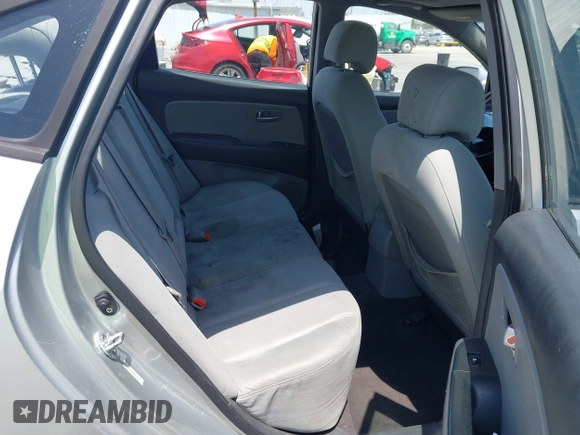 2009 Hyundai Elantra GLS z VIN KMHDU46D89U716718, wystawiony jako IAAI lot #42282841 z przebiegiem 130 843 mil mil oraz . Historia ofert i sprzedaży dostępna na DreamBid. Obrazek 8.
