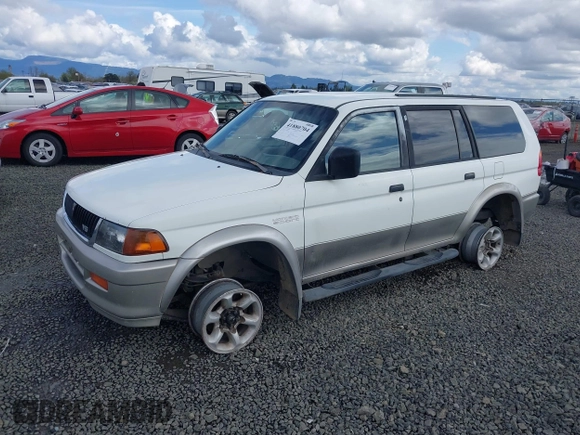 1998 Mitsubishi Montero LS z VIN JA4MT31P3WP025054, wystawiony jako IAAI lot #41880704 z przebiegiem 381 966 mil mil oraz . Historia ofert i sprzedaży dostępna na DreamBid. Obrazek 2.