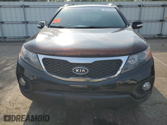 2013 Kia Sorento EX with VIN 5XYKU4A60DG394087, listed as a Copart auction lot 60324665 with 130,736 mi miles and Salvage title. Bid and sale history available at DreamBid. Image 5.