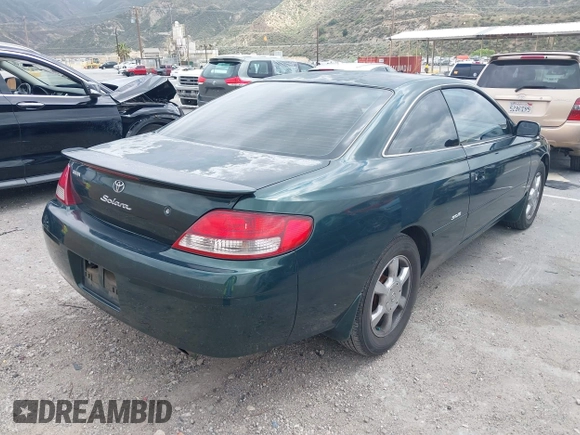 1999 Toyota Solara SE with VIN 2T1CF22P7XC150690, listed as a IAAI auction lot 42051493 with 251,411 mi miles. Bid and sale history available at carsss.com. Image 4.