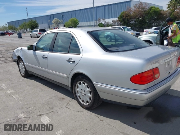 1998 Mercedes-Benz E-Class with VIN WDBJF65F5WA702626, listed as a IAAI auction lot 42014815 with 113,632 mi miles. Bid and sale history available at carsss.com. Image 3.