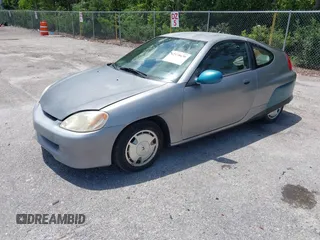 2004 Honda Insight z VIN JHMZE14744T000527, wystawiony jako IAAI lot #42378630 z przebiegiem 1 360 mil mil oraz . Historia ofert i sprzedaży dostępna na DreamBid. Obrazek 2.