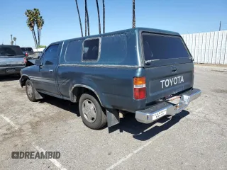 1994 Toyota Pickup DLX z VIN 4TARN81P2RZ175695, wystawiony jako Copart lot #50415385 z przebiegiem 258 048 mil mil oraz Szkoda całkowita • Salvage title. Historia ofert i sprzedaży dostępna na DreamBid. Obrazek 2.
