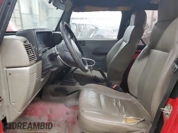 2004 Jeep Wrangler SE с VIN 1J4FA29164P771472, выставлен на аукционе Copart как лот 48162335 с пробегом 175 764 миль миль и Списание • Salvage title. История ставок и продаж доступна на DreamBid. Изображение 7.