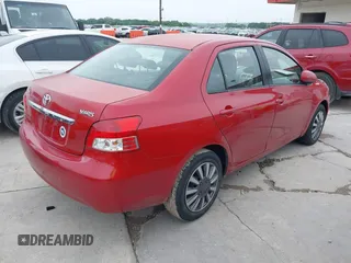 2007 Toyota Yaris with VIN JTDBT903071077664, listed as a IAAI auction lot 42175827 with 154,079 mi miles. Bid and sale history available at carsss.com. Image 4.