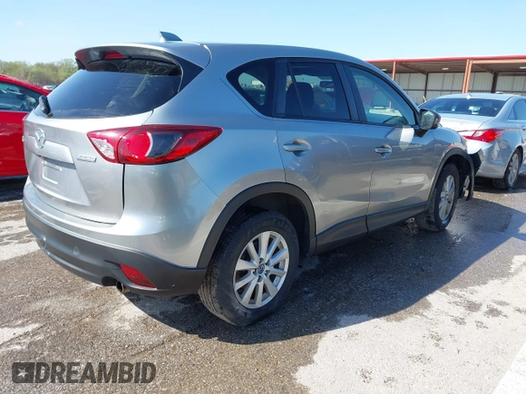 2013 Mazda CX-5 Touring with VIN JM3KE2CE6D0164430, listed as a IAAI auction lot 41961655 with 194,278 mi miles. Bid and sale history available at carsss.com. Image 4.