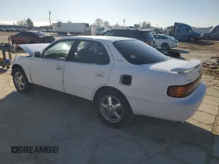 1992 Toyota Camry LE z VIN 4T1SK12E8NU044387, wystawiony jako Copart lot #43195915 z przebiegiem 279 199 mil mil oraz Szkoda całkowita • Salvage title. Historia ofert i sprzedaży dostępna na DreamBid. Obrazek 2.