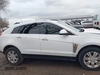 2013 Cadillac SRX Luxury Collection with VIN 3GYFNCE32DS527577, listed as a IAAI auction lot 41916467 with 137,462 mi miles and . Bid and sale history available at DreamBid. Image 14.