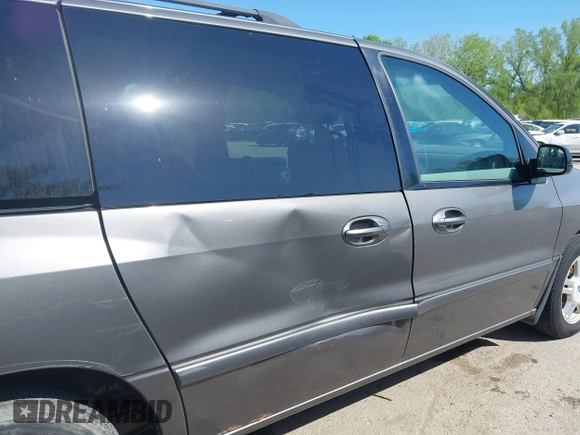 2006 Ford Freestar SEL z VIN 2FMZA52246BA23512, wystawiony jako IAAI lot #42081504 z przebiegiem Nie podano mil oraz . Historia ofert i sprzedaży dostępna na DreamBid. Obrazek 6.