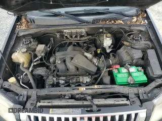 2008 Mercury Mariner z VIN 4M2CU91148KJ28250, wystawiony jako Copart lot #87071464 z przebiegiem 131 203 mil mil oraz Szkoda całkowita • Salvage title. Historia ofert i sprzedaży dostępna na DreamBid. Obrazek 12.