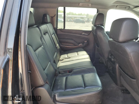 2019 Chevrolet Suburban LT with VIN 1GNSCHKC2KR167309, listed as a Copart auction lot 54475565 with 140,552 mi miles and Salvage Title. Bid and sale history available at DreamBid. Image 11.