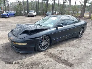 1995 Ford Probe z VIN 1ZVLT22B1S5104093, wystawiony jako IAAI lot #41744654 z przebiegiem 166 253 mil mil oraz . Historia ofert i sprzedaży dostępna na DreamBid. Obrazek 2.