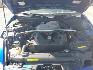 2005 Nissan 350Z Touring with VIN JN1AZ34DX5M601251, listed as a IAAI auction lot 41762746 with 108,855 mi miles. Bid and sale history available at carsss.com. Image 10.