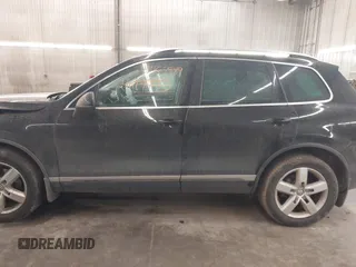 2012 Volkswagen Touareg Sport with VIN WVGEF9BP8CD009511, listed as a IAAI auction lot 41457989 with 87,325 mi miles and . Bid and sale history available at DreamBid. Image 15.